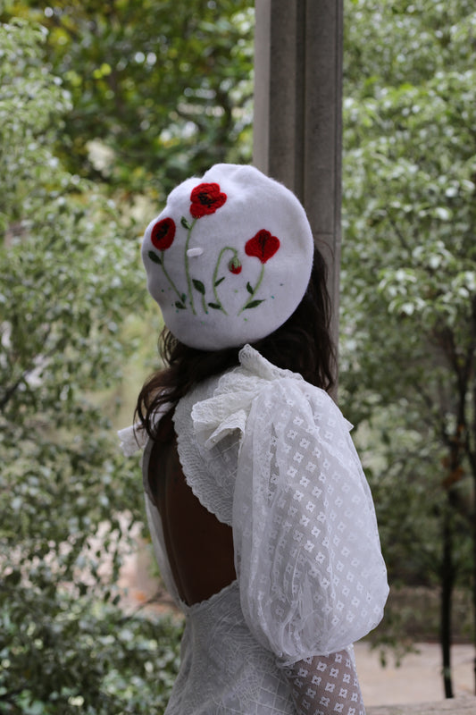 Felted hat with poppies