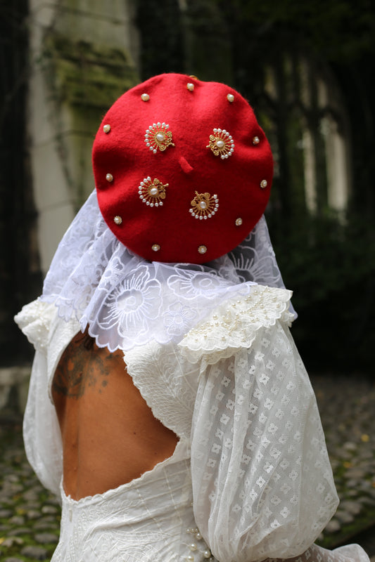 Red beret with embellishments